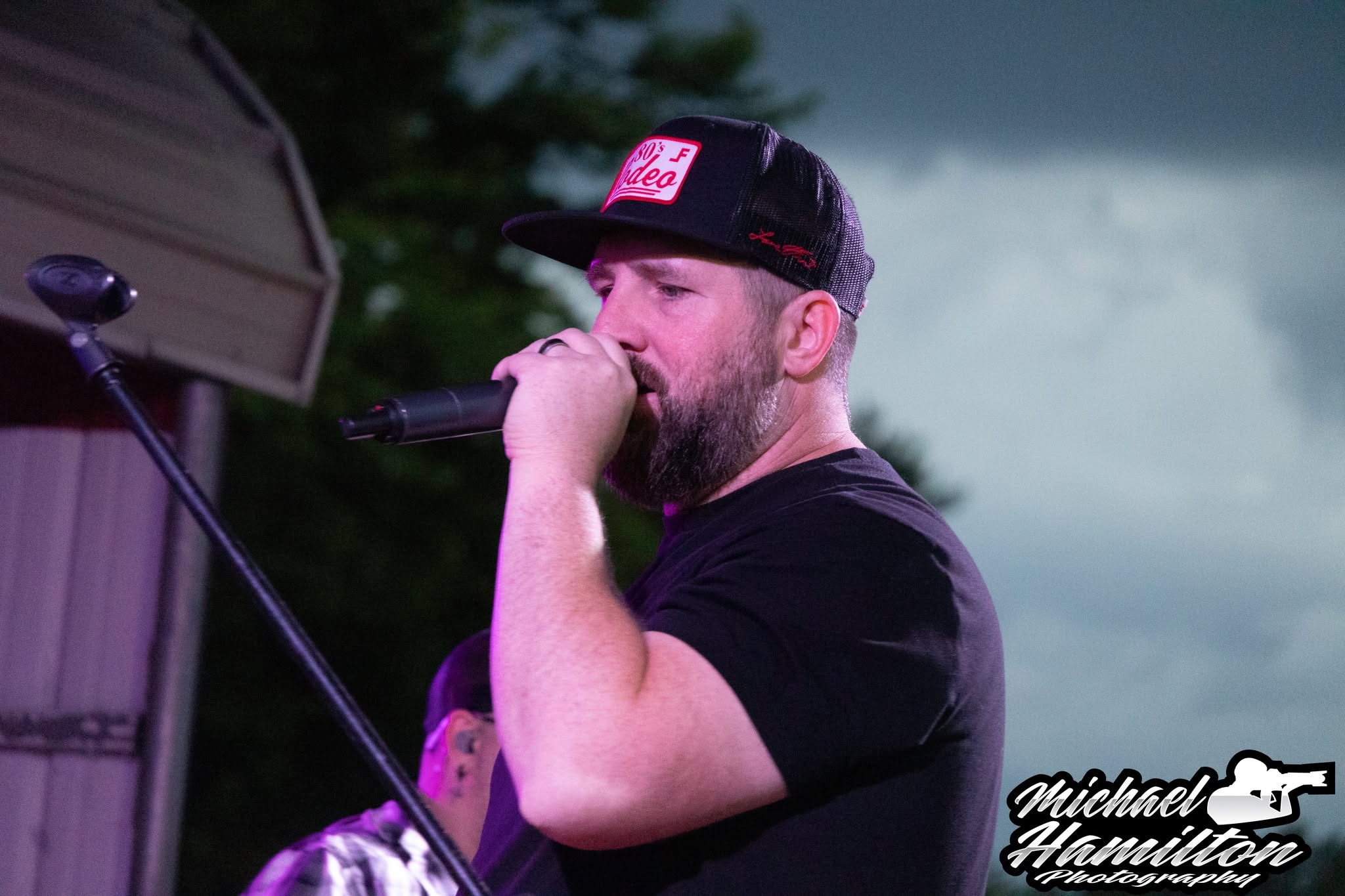 Lee Gant performing on stage